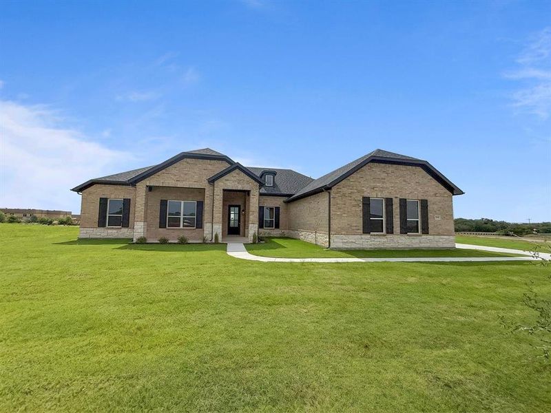 Front exterior of a new home in Calhoun Acres, Azle, TX, highlighting curb appeal (Image 1). Front exterior of a new home in Calhoun Acres, Azle, TX, highlighting curb appeal (Image 1).