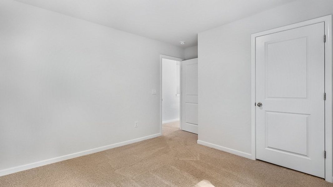 Spacious, unfurnished interior of a new home in The Landing at Summerhaven, Mebane (Image 28).