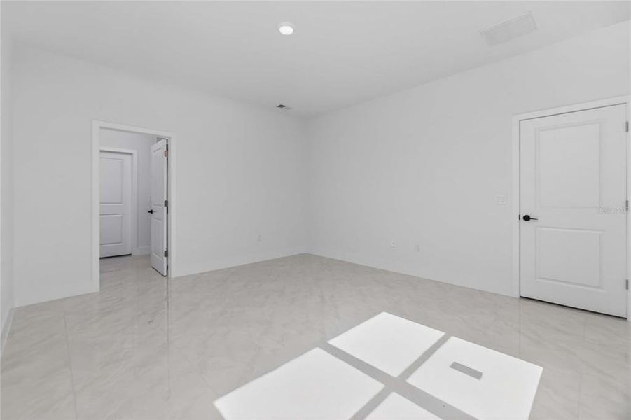 Spacious, unfurnished interior of a new home in , Port Charlotte (Image 45).