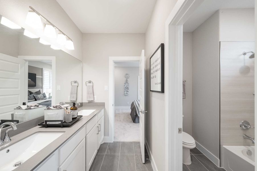 Furnished interior view inside a new home in Dunham Pointe 80′, Cypress (Image 40).