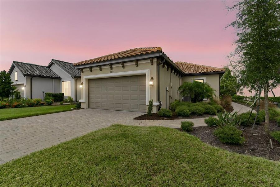 Front exterior of a new home in , Wesley Chapel, FL, highlighting curb appeal (Image 28). Front exterior of a new home in , Wesley Chapel, FL, highlighting curb appeal (Image 28).