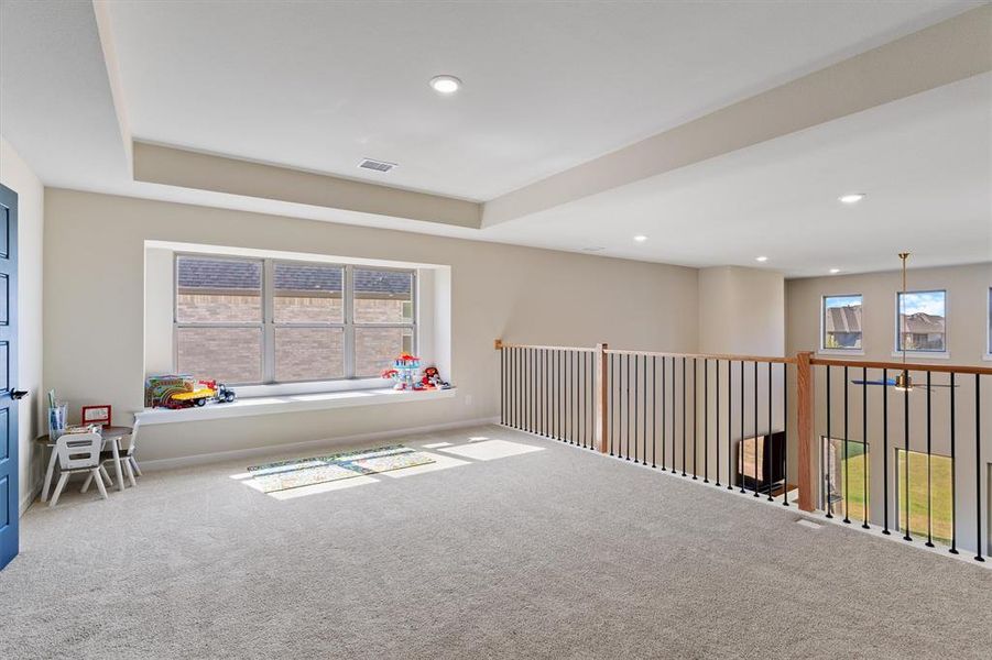 Upstairs Game Room with entry to Media Room