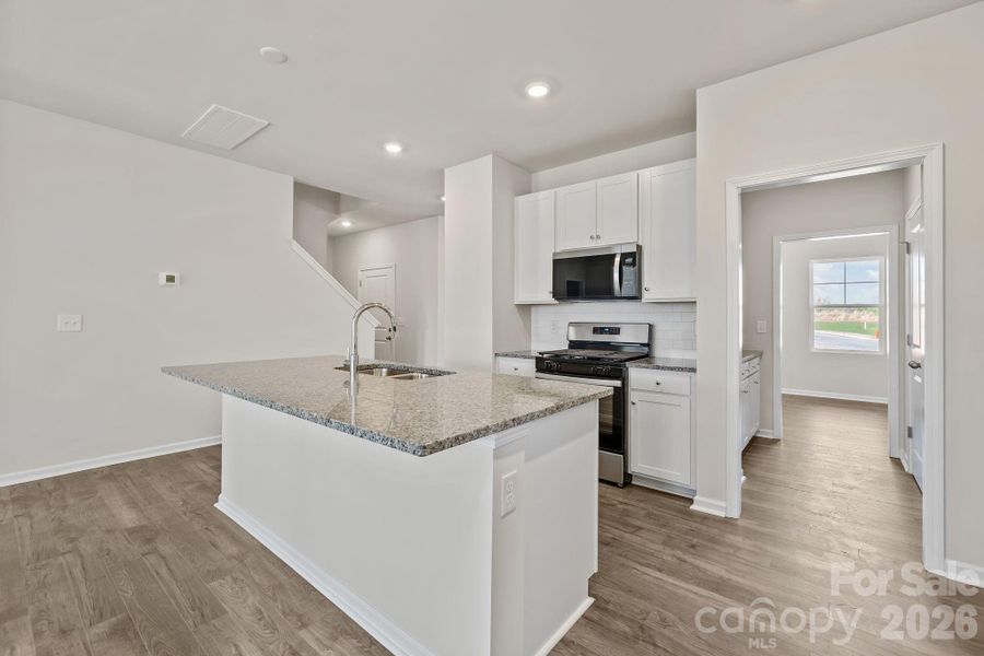 Furnished interior view inside a new home in McFarland Estates, York (Image 14).