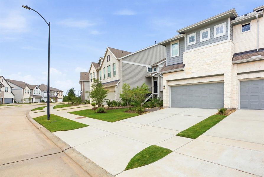 Front exterior of a new home in , Cypress, TX, highlighting curb appeal (Image 26).