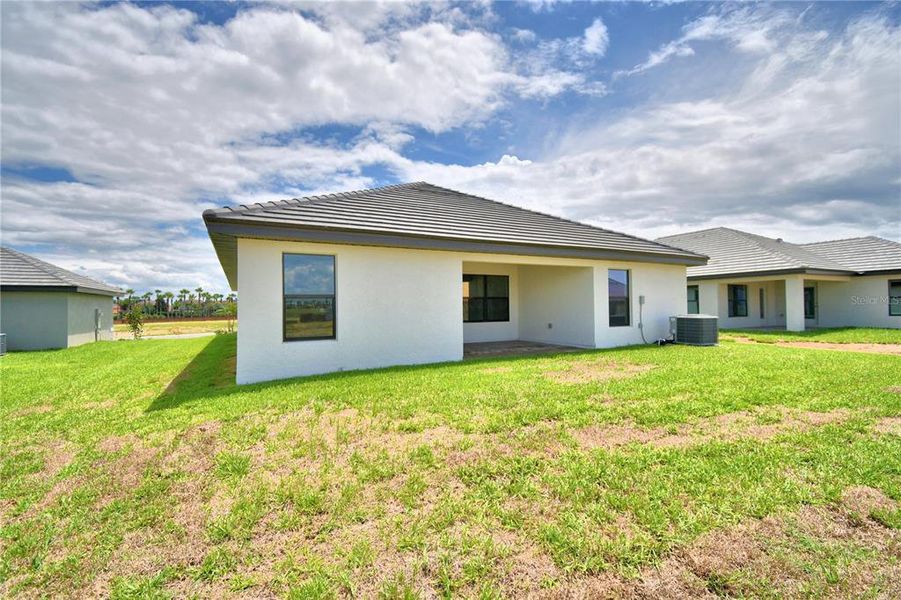 Exterior details and patio area of a home in , Auburndale (Image 23).