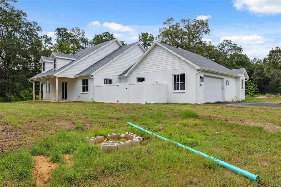 Exterior details and patio area of a home in , Brooksville (Image 27).