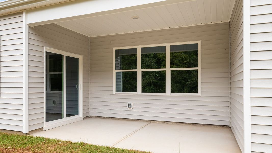 Front exterior of a new home in Villa Grande, Winterville, NC, highlighting curb appeal (Image 18).