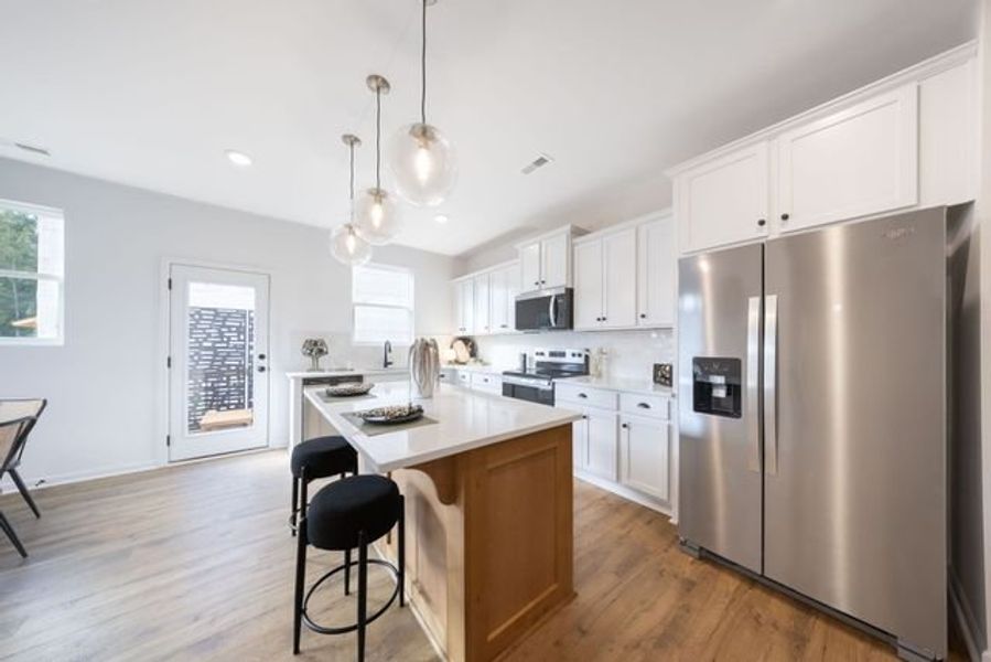Representative furnished interior of a home built from the Myka TH by True Homes in Dukes Ridge, Charlotte (Image 5).