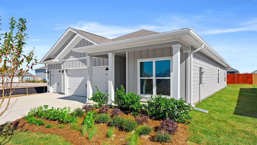 Front exterior of a new home in Titus Park, Panama City, FL, highlighting curb appeal (Image 24).