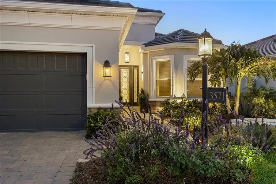 Exterior details and patio area of a home in Esplanade at Azario Lakewood Ranch, Bradenton (Image 4).