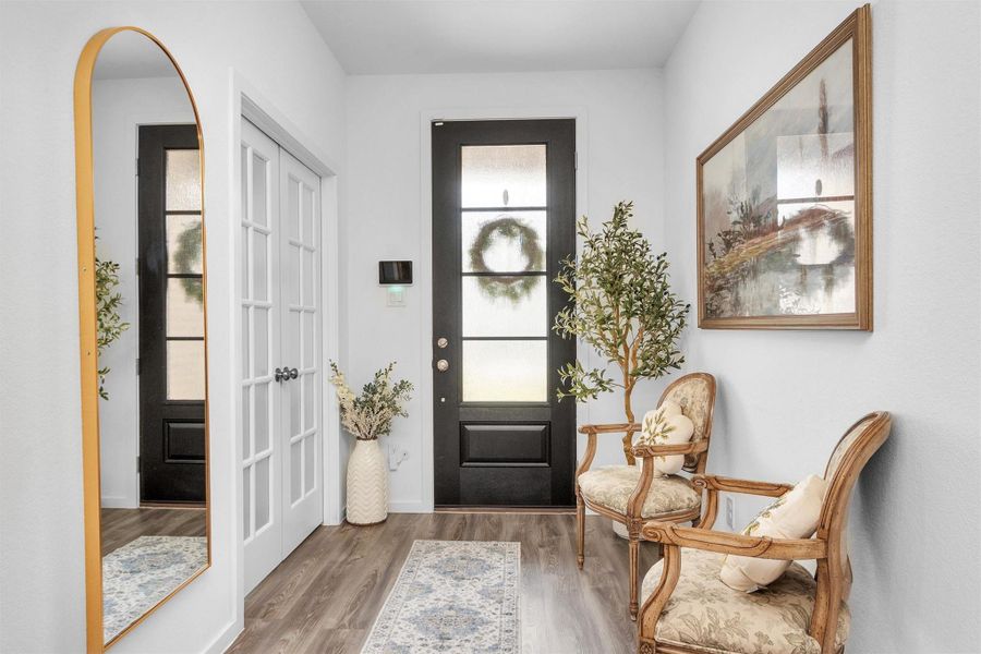 Entry hall with vinyl plank floors