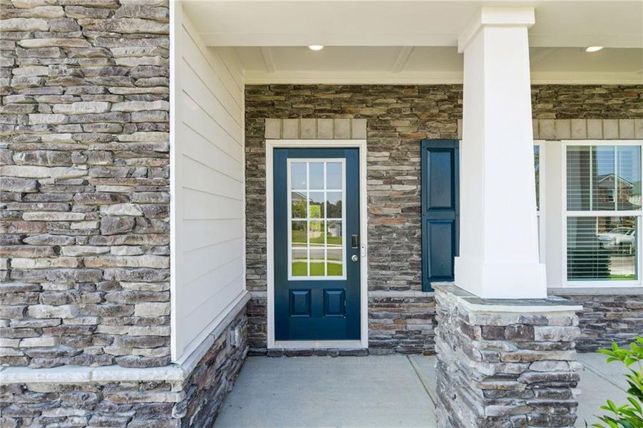 Exterior details and patio area of a home in Preserve at Mountain Creek, Pendergrass (Image 25).