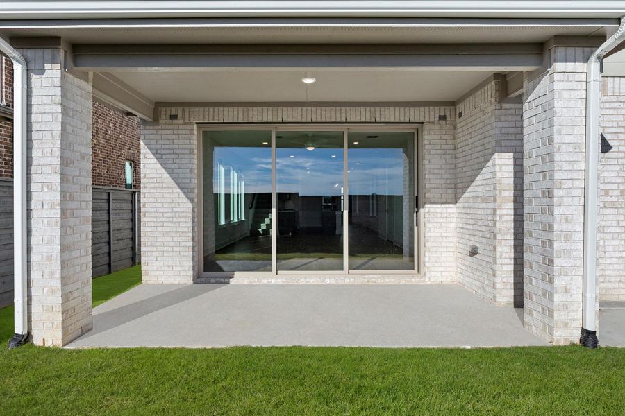 Exterior details and patio area of a home in Garden Collection at Union Park, Little Elm (Image 3).