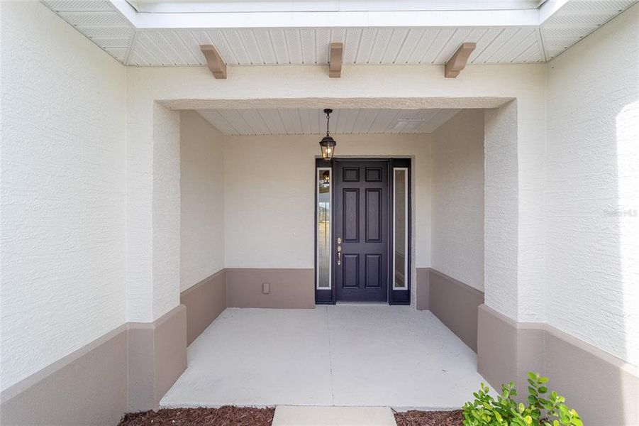 Exterior details and patio area of a home in On Top of the World Communities, Ocala (Image 23).