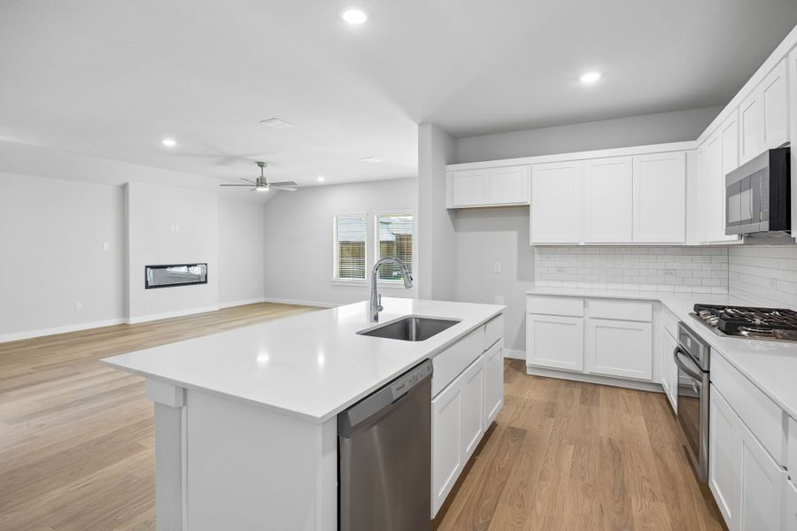 Open Floor Plan in the Oscar home plan by Trophy Signature Homes – REPRESENTATIVE PHOTO