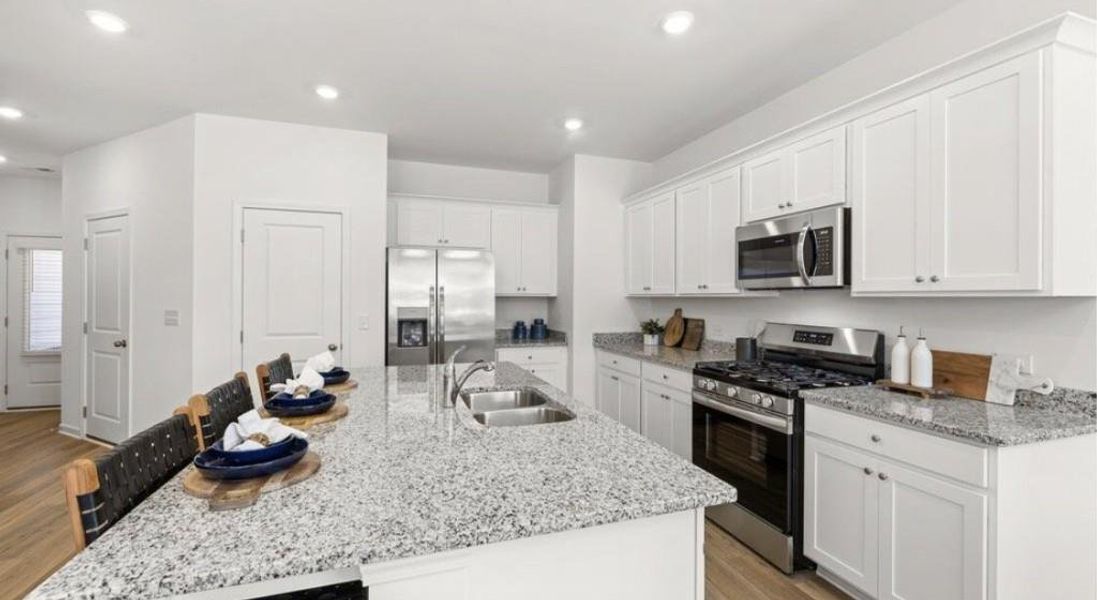 Furnished interior view inside a new home in Towns at Ivy Creek, Buford (Image 3).