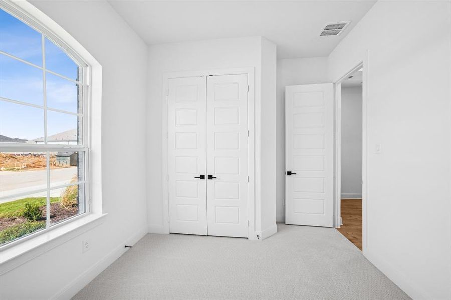 Spacious, unfurnished interior of a new home in Pecan Square - Gardens, Northlake (Image 30). Spacious, unfurnished interior of a new home in Pecan Square - Gardens, Northlake (Image 30).