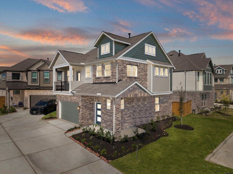 Front exterior of a new home in Balmoral, Humble, TX, highlighting curb appeal (Image 1). Front exterior of a new home in Balmoral, Humble, TX, highlighting curb appeal (Image 1).