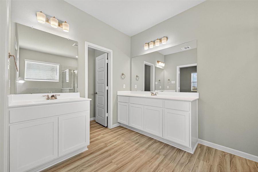 Furnished interior view inside a new home in Sunterra, Katy (Image 15).