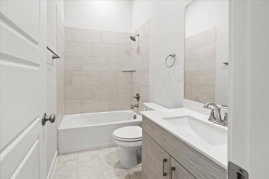 Furnished interior view inside a new home in Trace, San Marcos (Image 21).