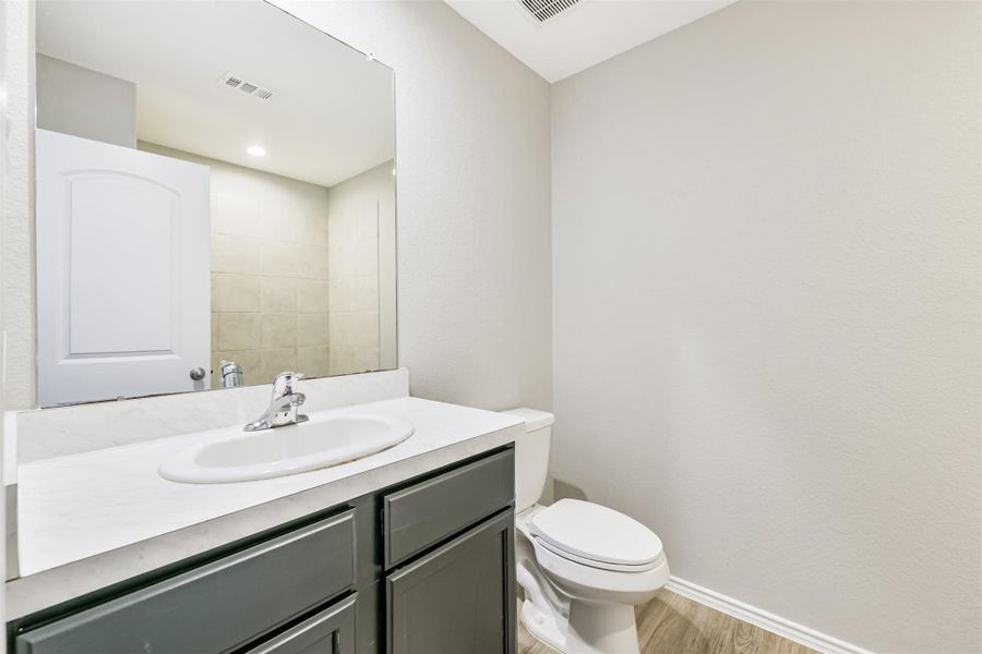 Furnished interior view inside a new home in Harrington Trails at The Canopies, New Caney (Image 17).