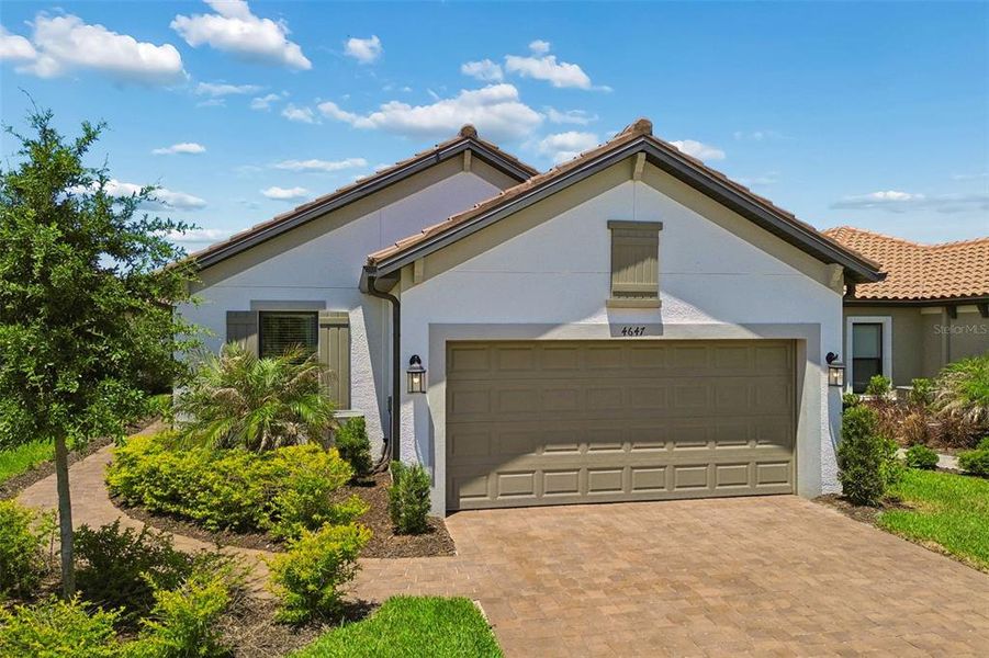 Front exterior of a new home in , Wesley Chapel, FL, highlighting curb appeal (Image 25).