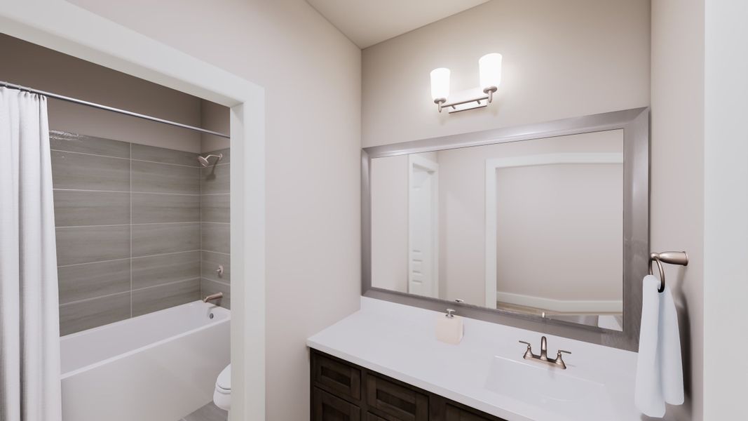 Representative furnished interior of a home built from the Carson by Tri Pointe Homes in Somerset Park, Rockwall (Image 12).