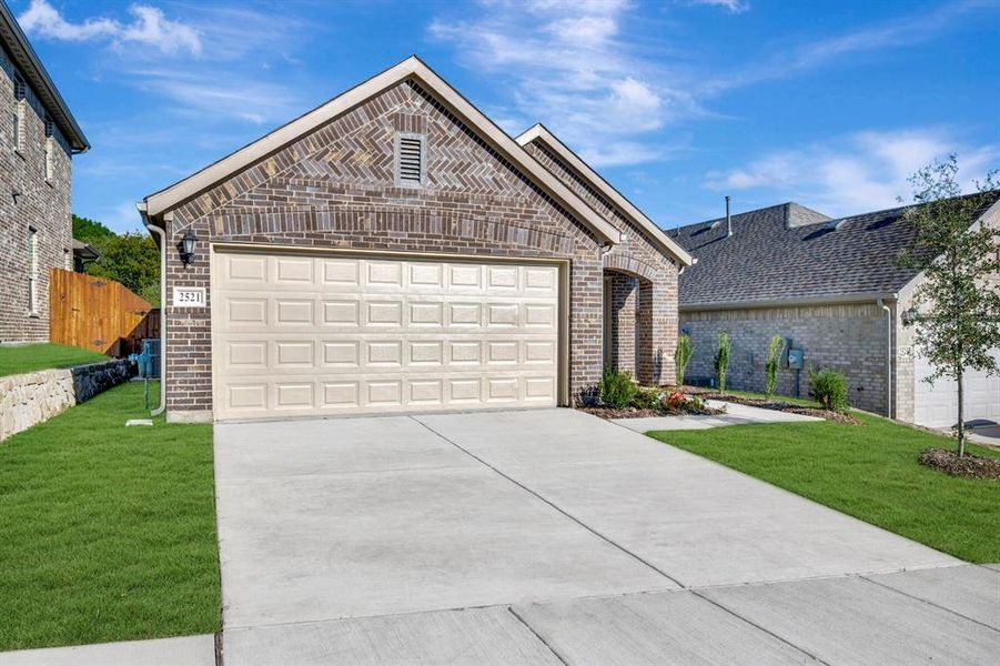 Front exterior of a new home in ValleyBrooke, Mesquite, TX, highlighting curb appeal (Image 1). Front exterior of a new home in ValleyBrooke, Mesquite, TX, highlighting curb appeal (Image 1).