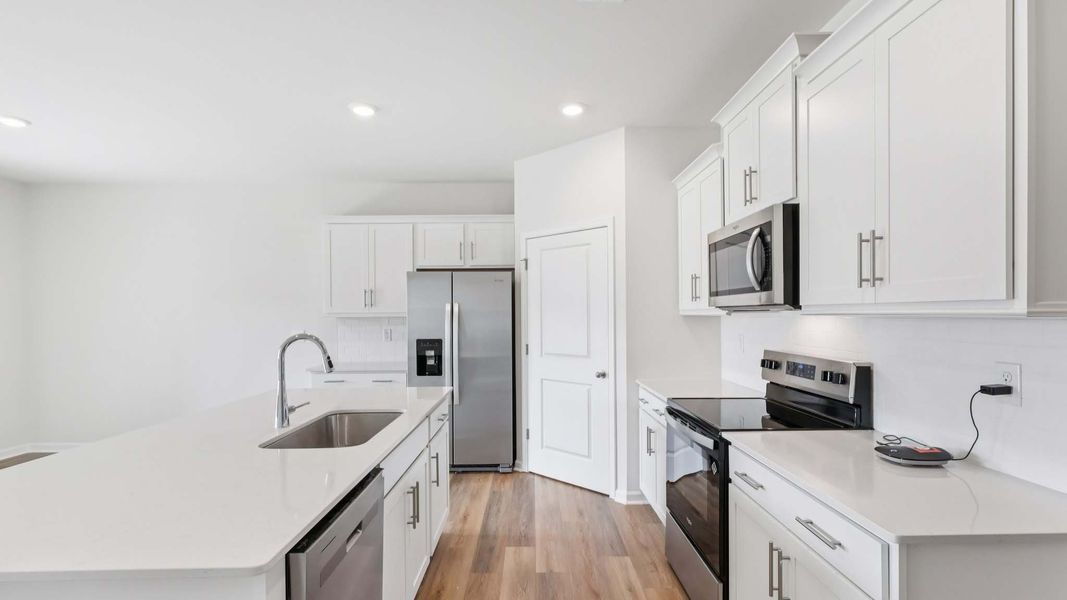 Representative furnished interior of a home built from the Cali by D.R. Horton in Granite Falls, Lancaster (Image 10).