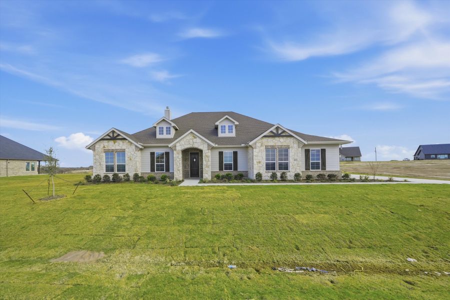 Front exterior of a new home in Eagle Ridge Estates, Weatherford, TX, highlighting curb appeal (Image 19).