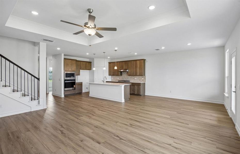 Spacious gathering room with beautiful flooring