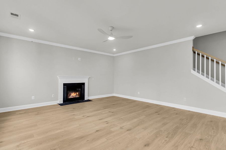 Spacious, unfurnished interior of a new home in Tidewater at Lakes of Cane Bay, Summerville (Image 29).