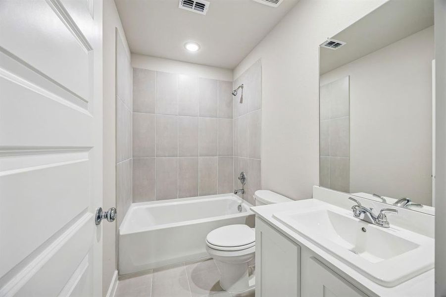 Bathroom in the Willow home plan by Trophy Signature Homes – REPRESENTATIVE PHOTO