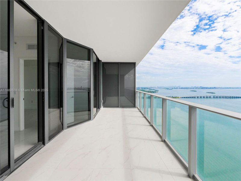 Exterior details and patio area of a home in Aria Reserve, Miami (Image 2).