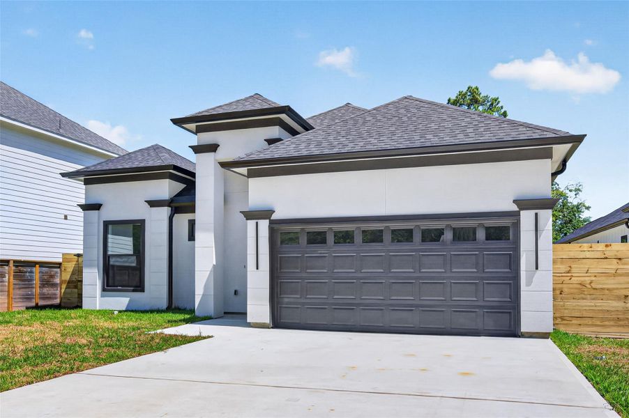 Front exterior of a new home in , Conroe, TX, highlighting curb appeal (Image 28).