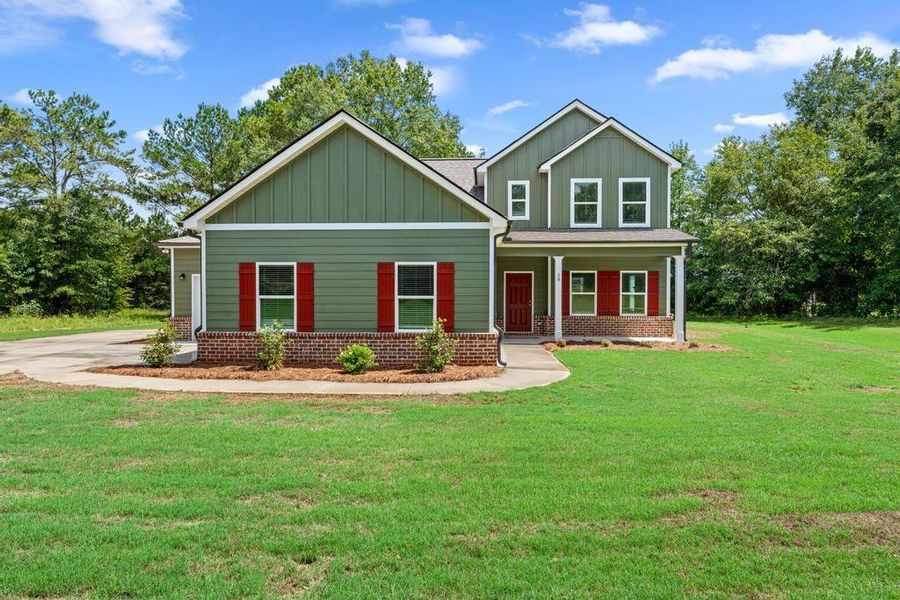Front exterior of a new home in , McDonough, GA, highlighting curb appeal (Image 15).