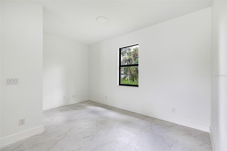 Spacious, unfurnished interior of a new home in , Port Charlotte (Image 22).