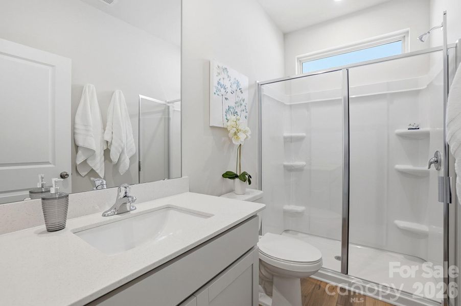 Furnished interior view inside a new home in Waxhaw Landing, Monroe (Image 4).