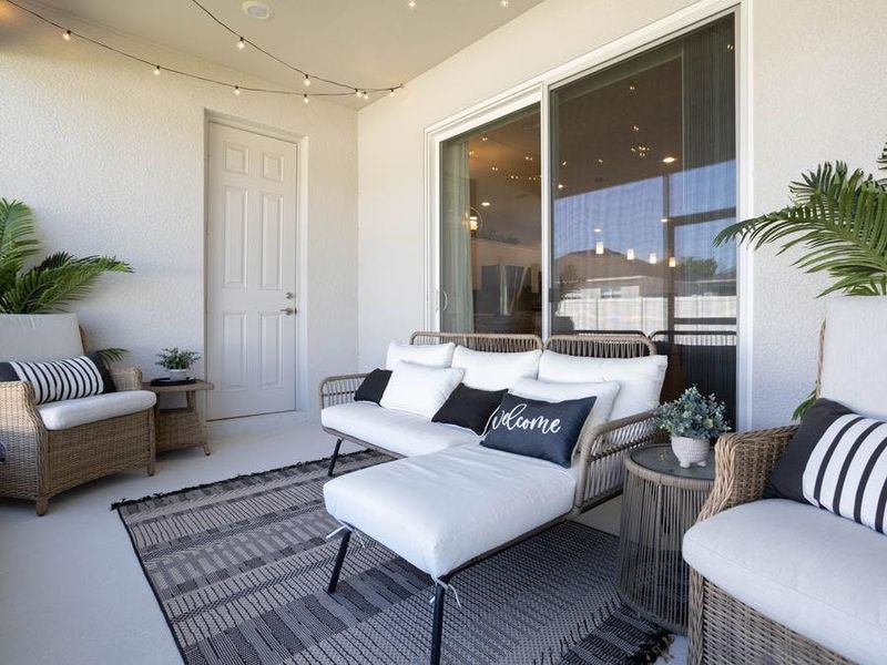 Your interior opens to desirable outdoor living space on your covered lanai - Waylyn by Highland Homes Your interior opens to desirable outdoor living space on your covered lanai - Waylyn by Highland Homes