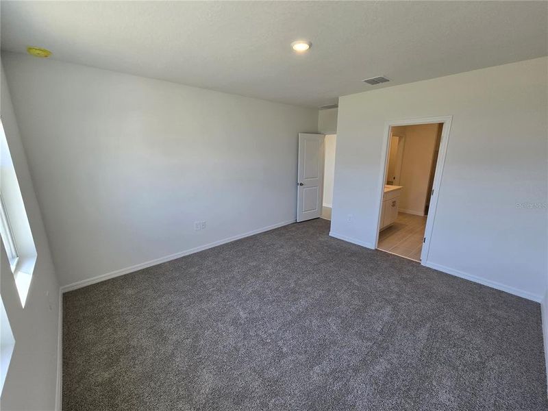 Spacious, unfurnished interior of a new home in Magnolia Bay - Classic Series, Nokomis (Image 10).