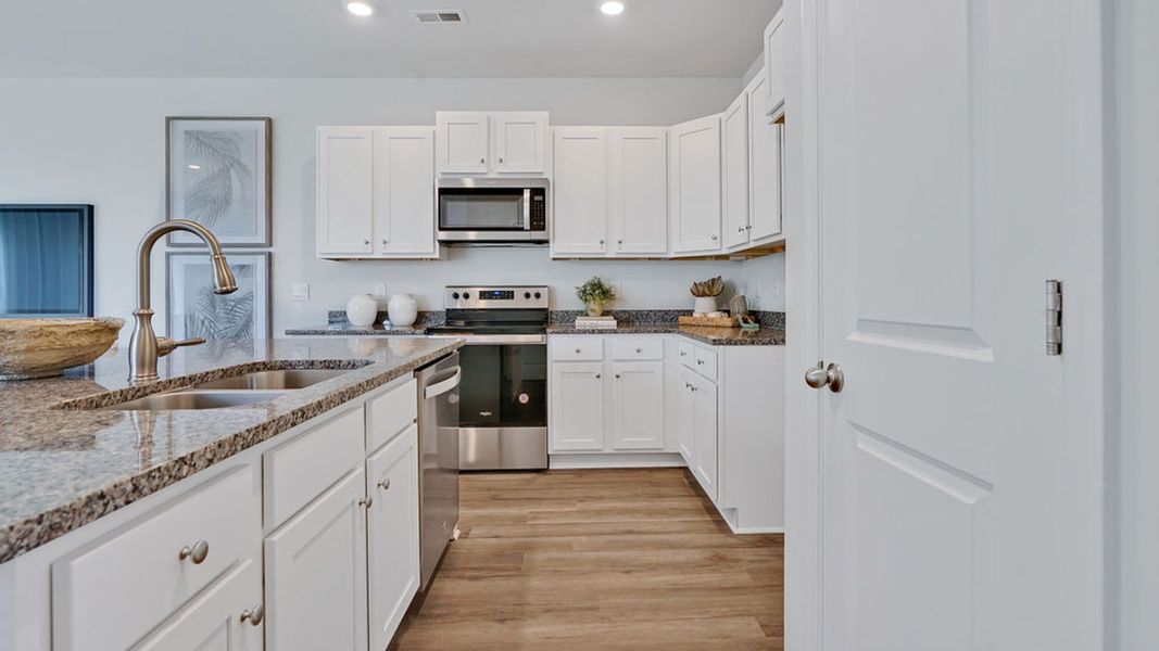 Furnished interior view inside a new home in Indigo Preserve Townhomes, Leland (Image 4).