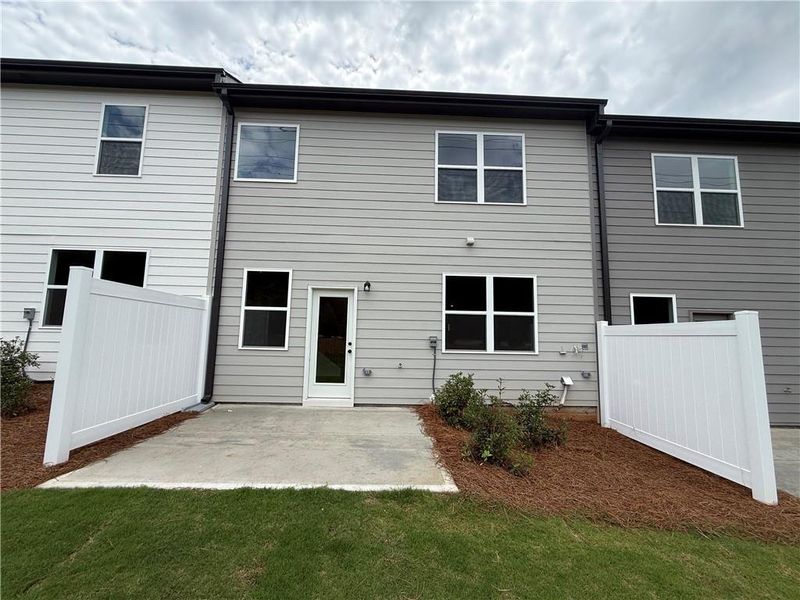 Exterior details and patio area of a home in The Towns at Auburn Station East, Auburn (Image 3).