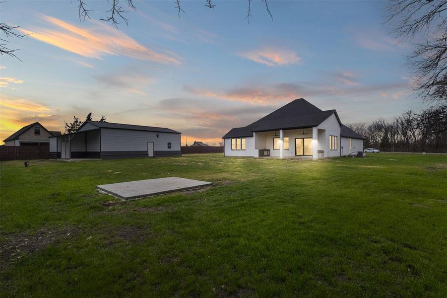 Exterior details and patio area of a home in , Farmersville (Image 3).