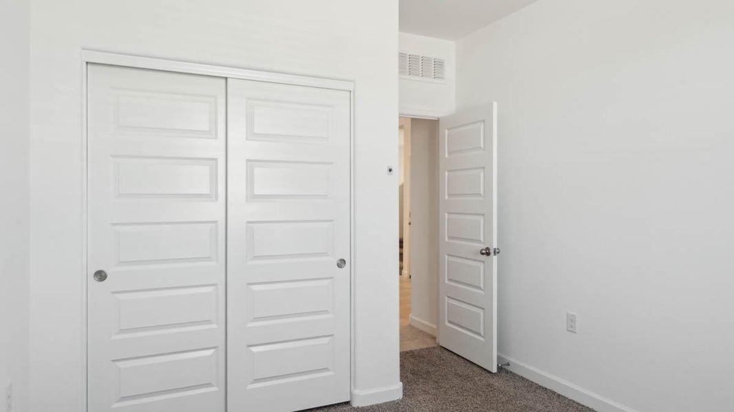 Representative unfurnished interior of a home built from the Mitchell by D.R. Horton in Upper Canyon, Phoenix (Image 24).