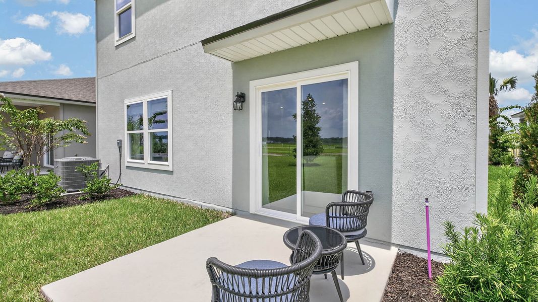 Exterior details and patio area of a home in Rookery, Green Cove Springs (Image 2).