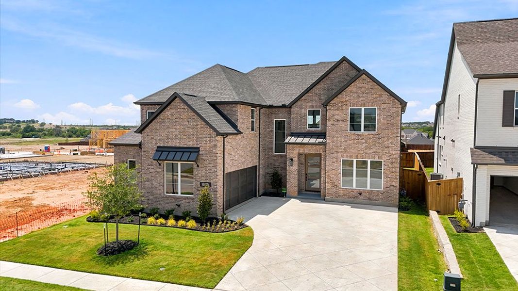 Front exterior of a new home in Furst Ranch, Argyle, TX, highlighting curb appeal (Image 25).