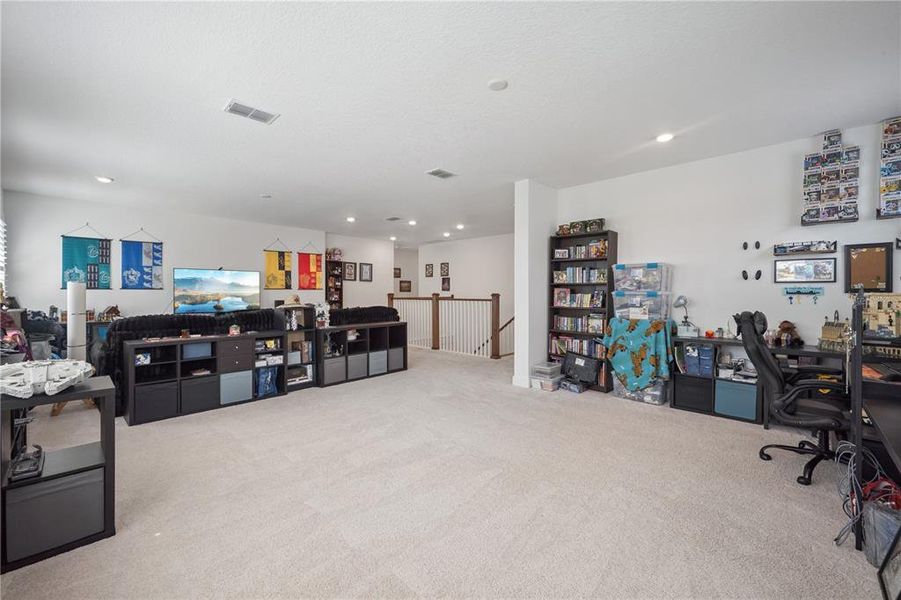Furnished interior view inside a new home in Northlake at Ovation, Winter Garden (Image 37).