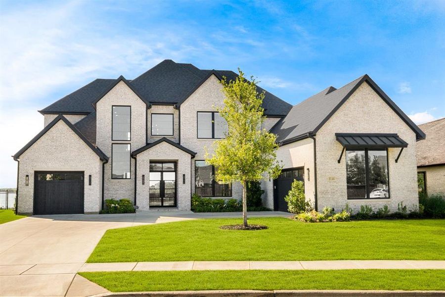 Front exterior of a new home in , The Colony, TX, highlighting curb appeal (Image 21). Front exterior of a new home in , The Colony, TX, highlighting curb appeal (Image 21).