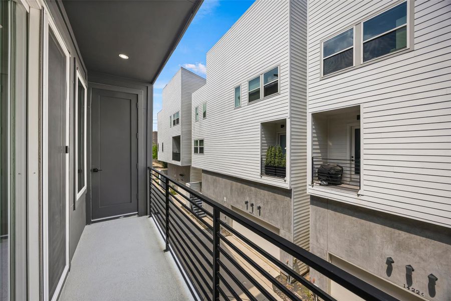 Exterior details and patio area of a home in , Houston (Image 3).