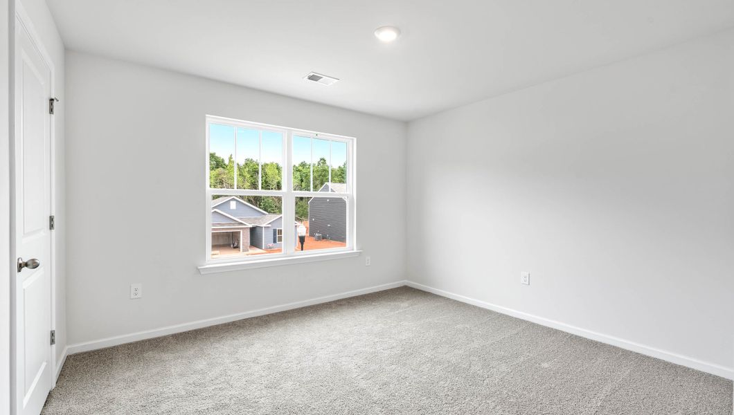Spacious, unfurnished interior of a new home in Paddock Point, Roebuck (Image 25).